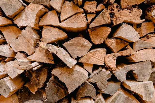 Free albizia firewood, split and stacked, Hamakua side