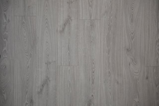 Four boxes vinyl plank flooring, gray oak look