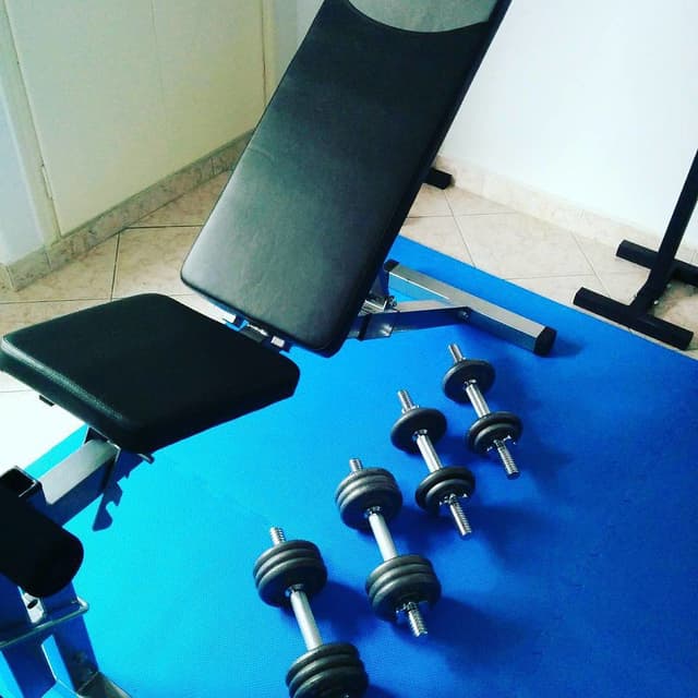 Cast iron dumbbell set with adjustable bench